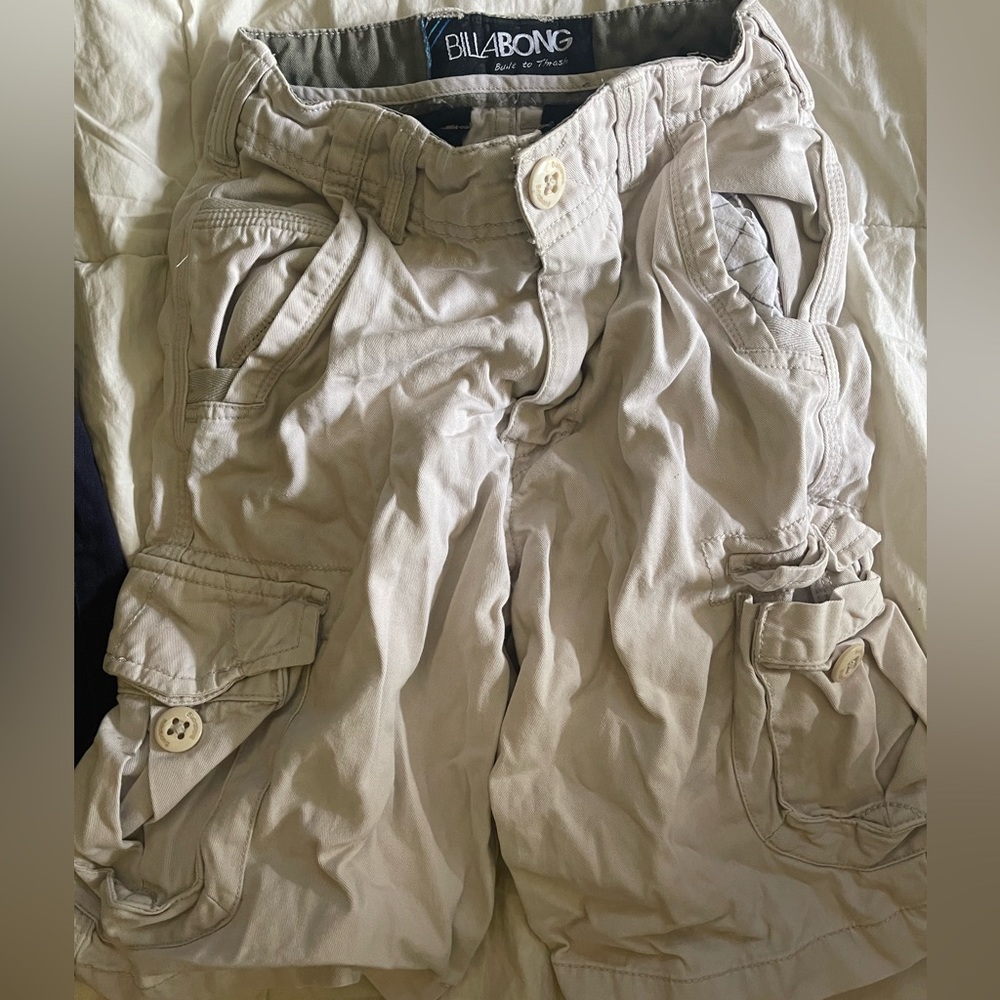 Our grown perfect condition . Billabong boys shorts size 23 , tan